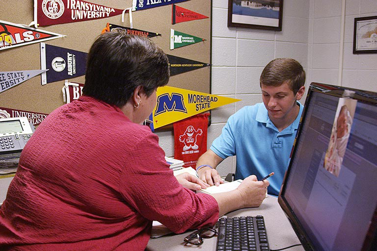 Guy talking to transfer counselor
