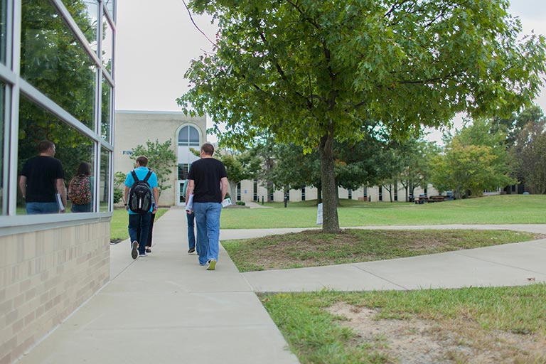 students walking on campus